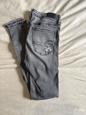 Women’s AE Gray Slim Fit Distressed Jeans